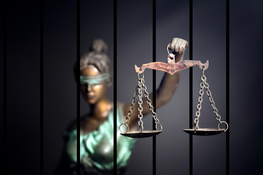 Lady of justice and prison