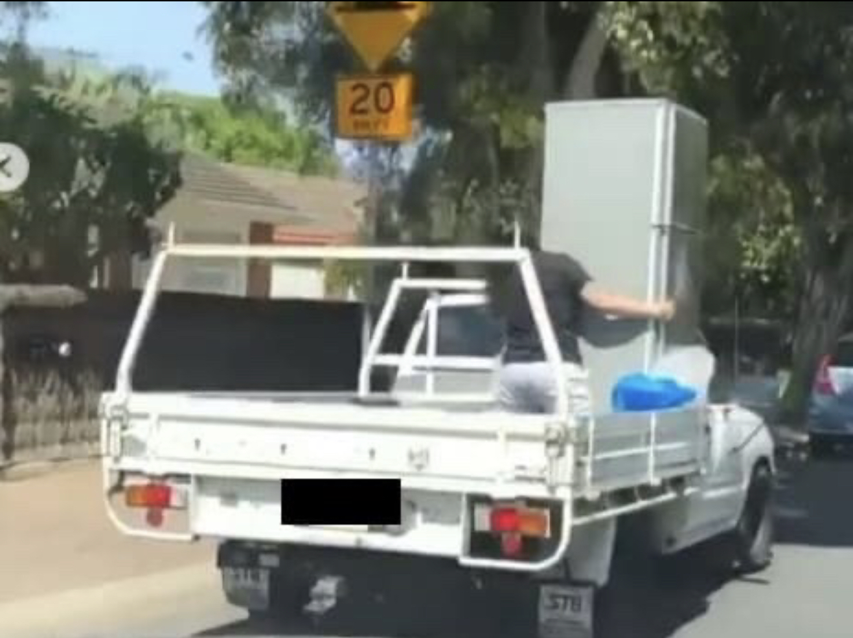 Woman standing on back of ute_instagram image.