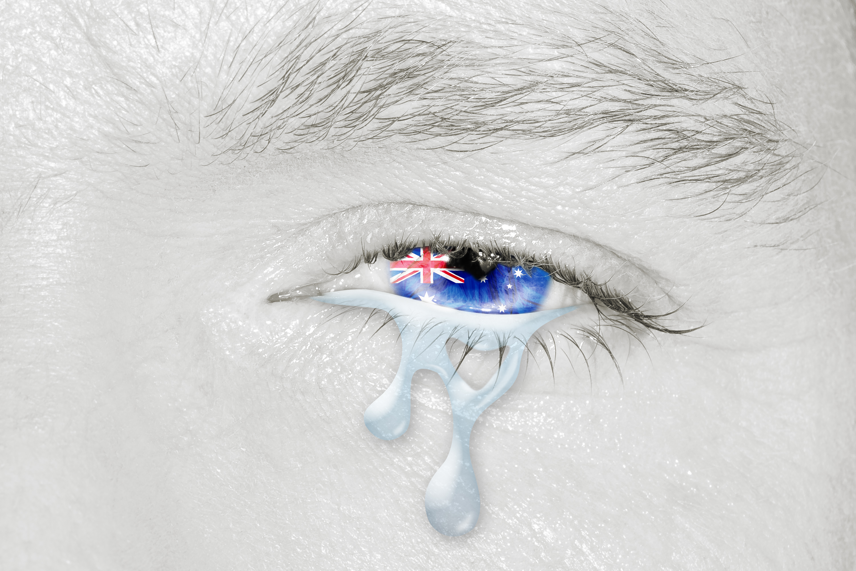 Scetch of eye with australian flag crying from bushfires